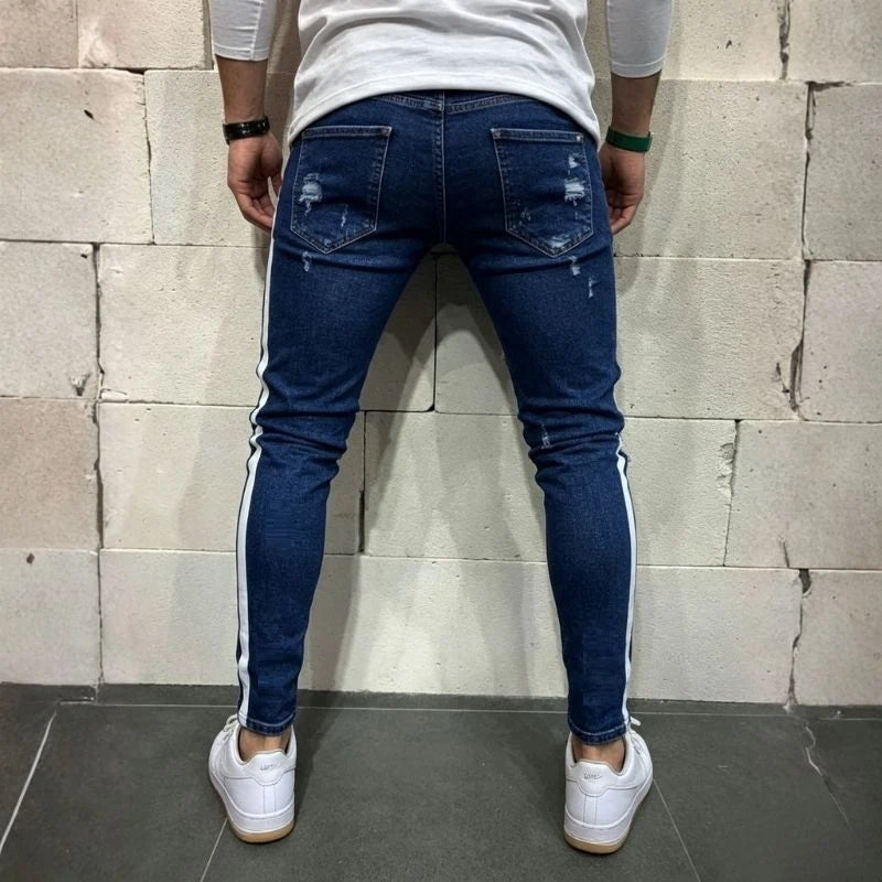 men's distressed skinny jeans with side stripes in navy, back view