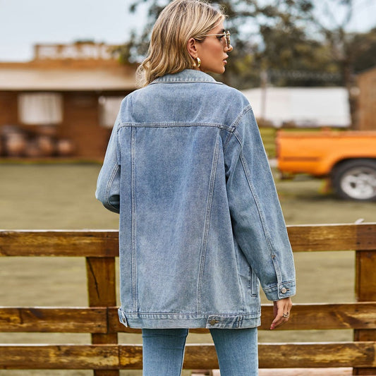 Women's washed denim jacket jean coat in light blue, back view