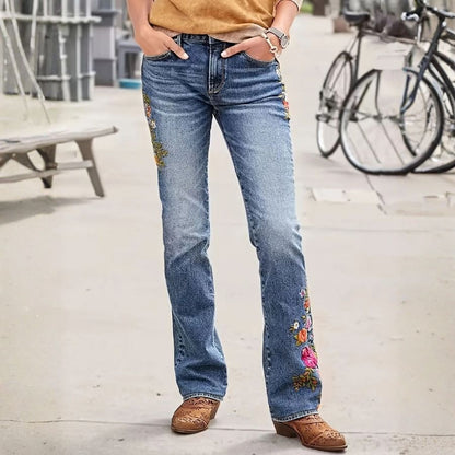 Floral embroidered skinny jeans 70's retro women's low rise slim fit stretch denim, front view