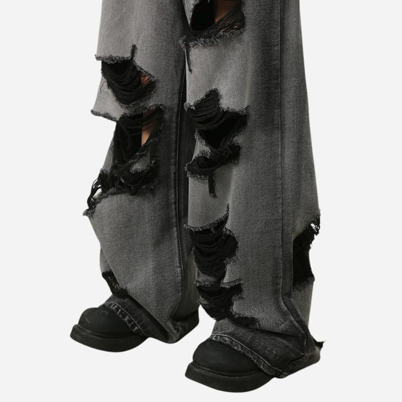 Hem details on men’s ripped baggy jeans y2k wide leg loose fit denim streetwear pants in black