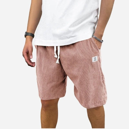 men's elastic waist drawstring summer beach shorts in pink, front view