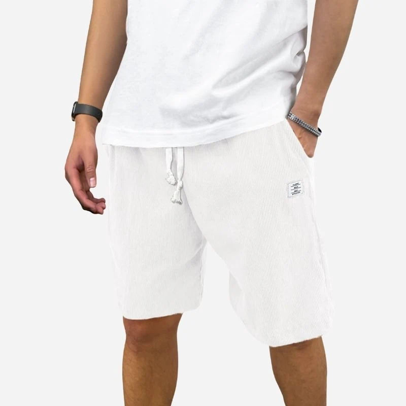 men's elastic waist drawstring summer beach shorts in white, front view