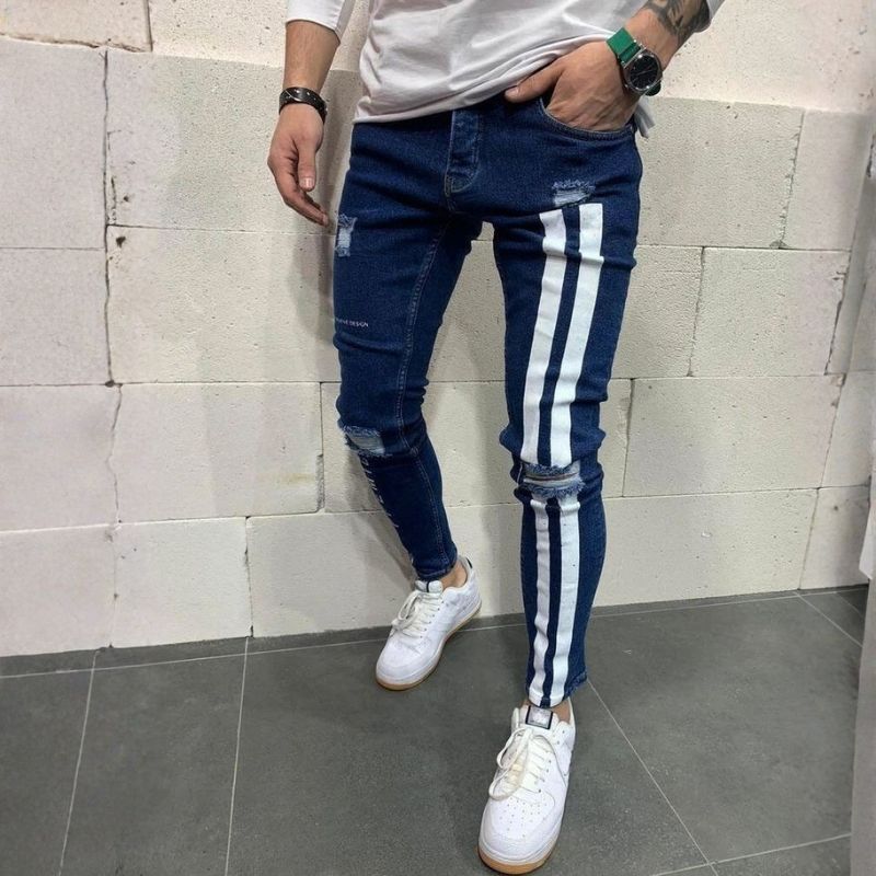 Men's distressed skinny jeans with side stripes stretch street denim in navy, front view