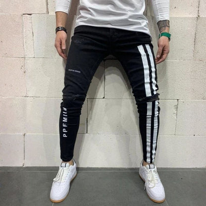 Men's distressed skinny jeans with side stripes stretch street denim in black, front view