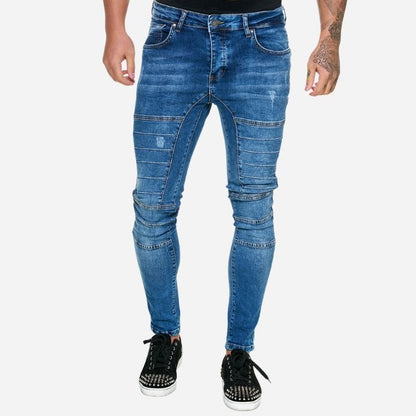 Men's panel moto jeans biker style tapered leg denim pants in navy, front view