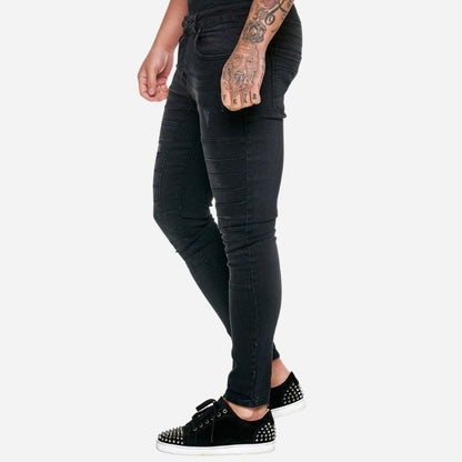 Men's panel moto jeans biker style tapered leg denim pants in black, side view