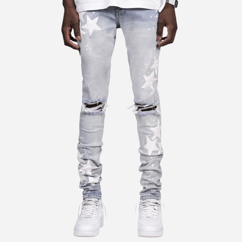 Men's star patch distressed skinny jeans in light blue, front view