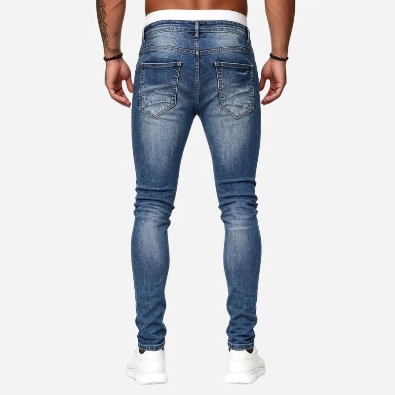 Men's ripped jeans stretch slim fit skinny denim pants in blue, back view