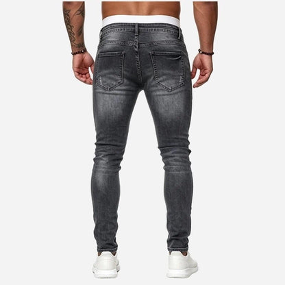 Men's ripped jeans stretch slim fit skinny denim pants in grey, back view