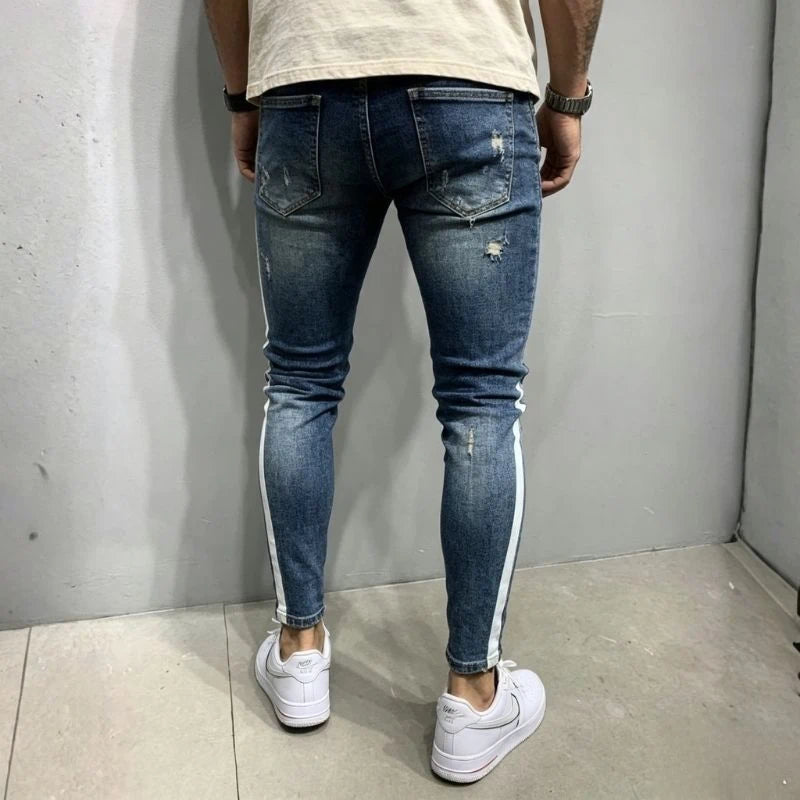 men's distressed skinny jeans with side stripes in blue, back view