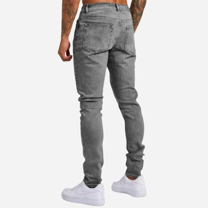 Men's skinny jeans high waisted slim fit denim pants in grey, back view