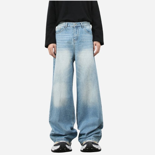 Men’s loose fit straight leg jeans in light blue, front view