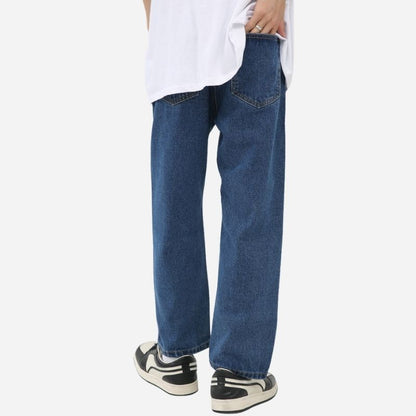 Men’s stretchy straight leg jeans in navy, back view