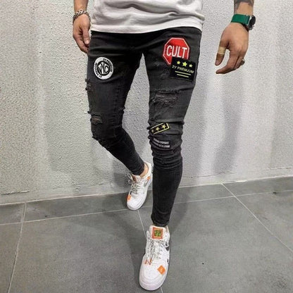 Men's ripped patch embroidered slim stretch skinny jeans in black, front view