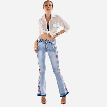 Women's floral embroidered flare jeans, front view