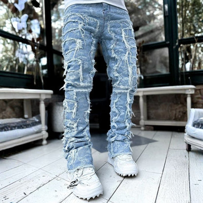 Stacked jeans men‘s skinny denim pants in blue printed, front view