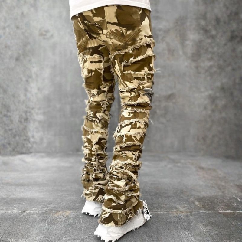 Stacked jeans men‘s skinny denim pants in camouflage, back view