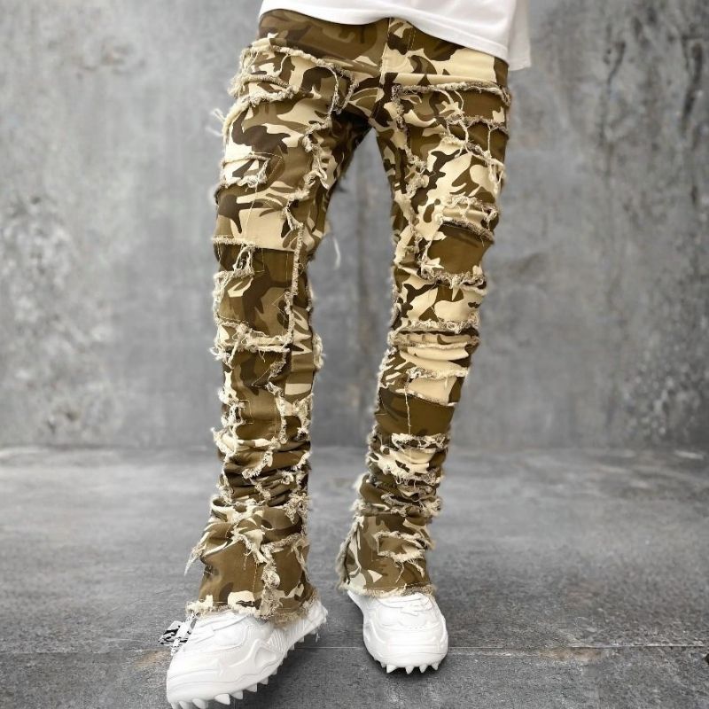 Stacked jeans men‘s skinny denim pants in camouflage, front view