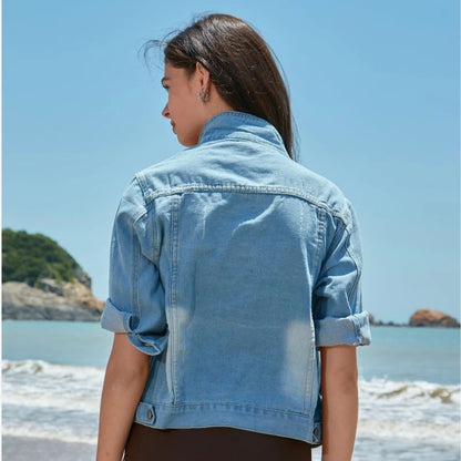 women's 3/4 sleeve cropped denim jacket in light blue, back view