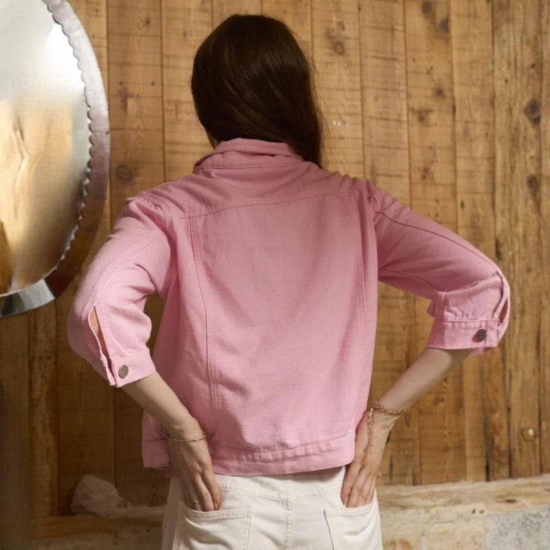 women's 3/4 sleeve cropped denim jacket in pink, back view