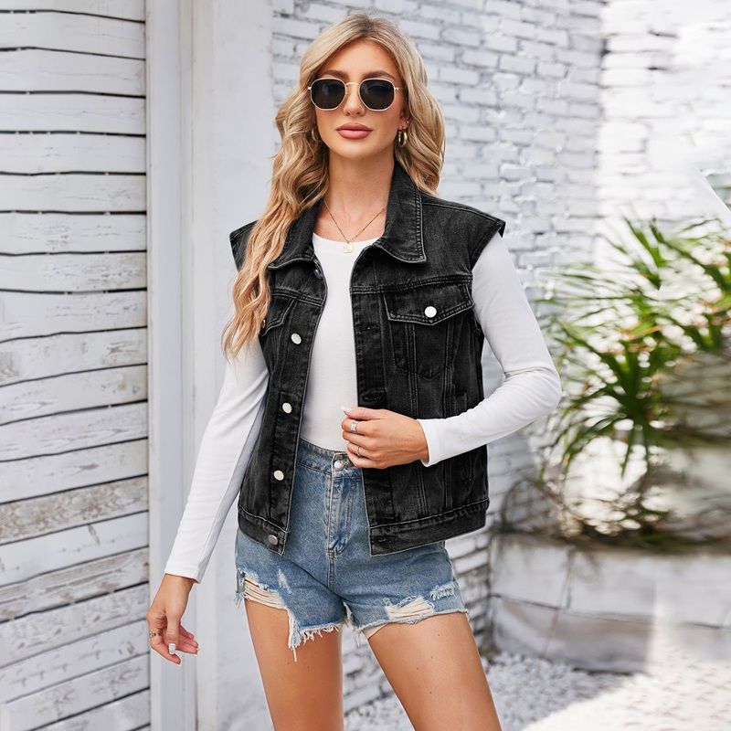 Women's cropped button front denim vest with pockets in black