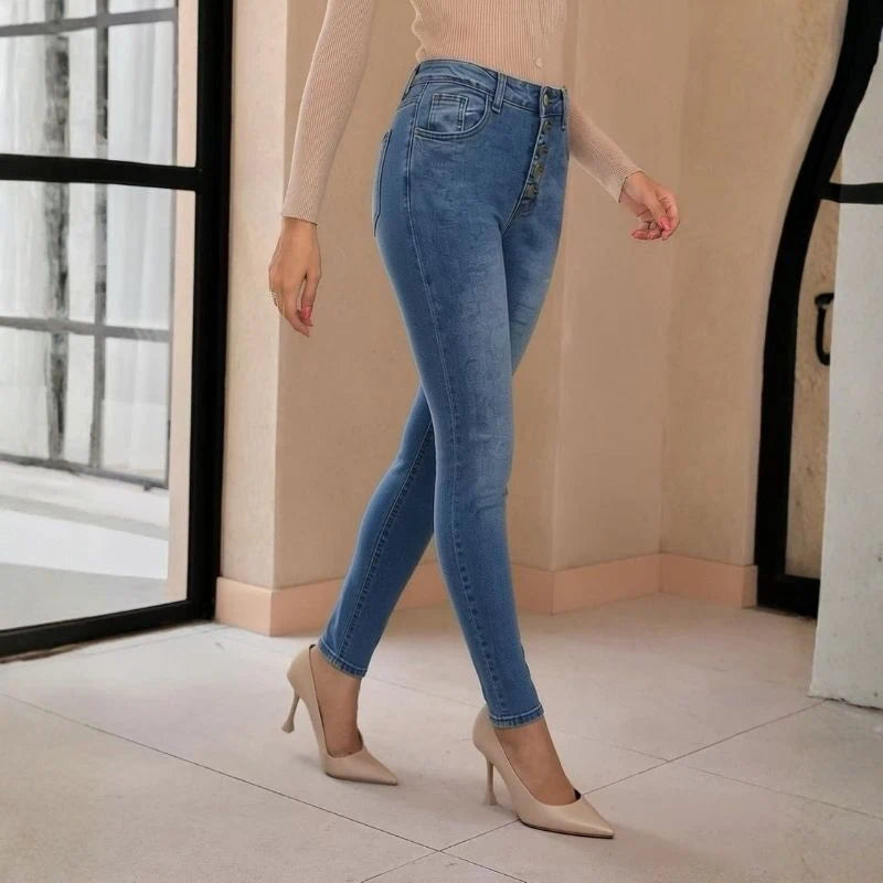 women's high waisted button fly skinny jeans in blue, side view