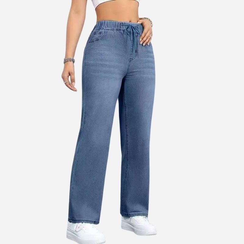 Women's high waisted pull on wide leg stretch drawstring denim pants in blue, side view