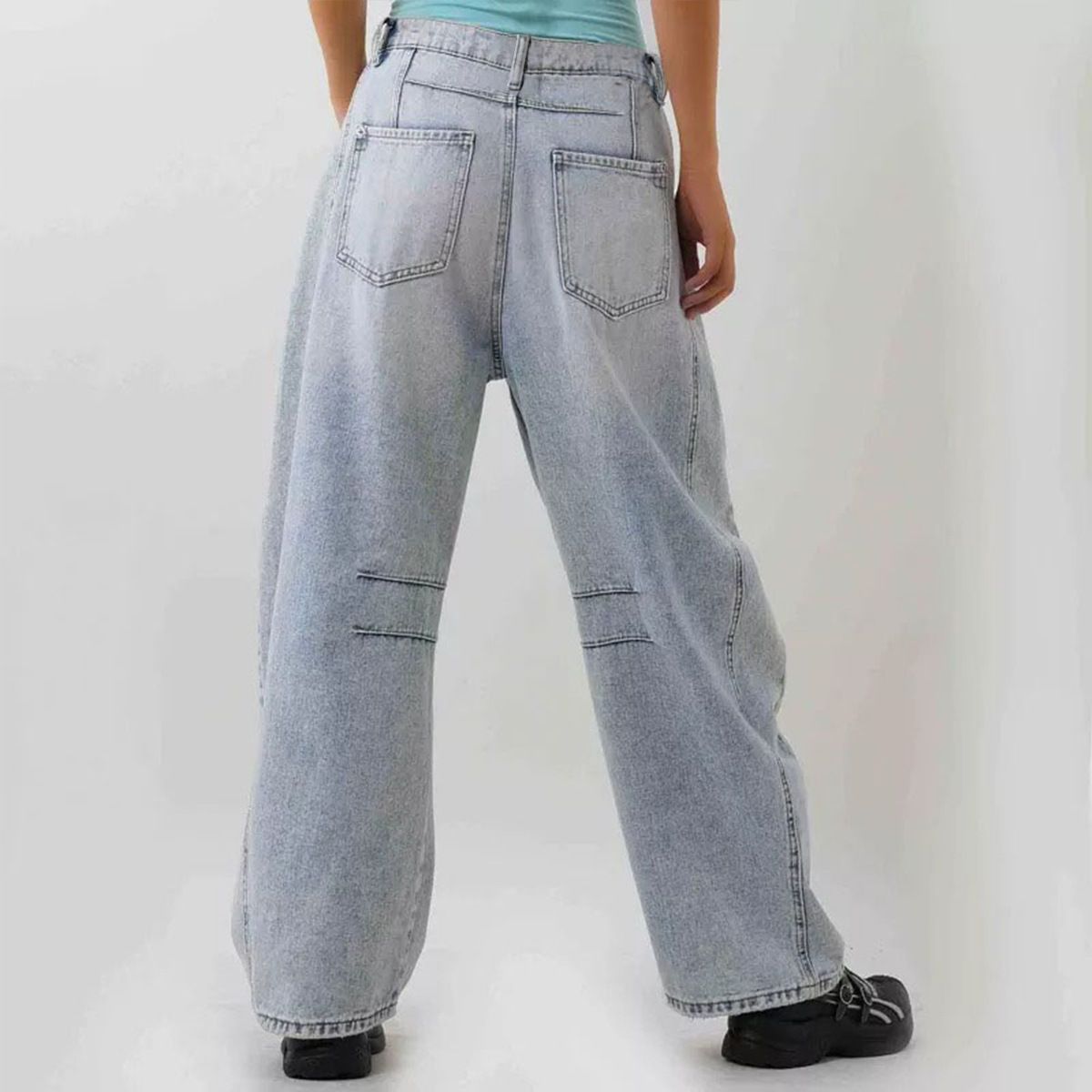 Women’s wide leg barrel jeans ripped baggy denim in light blue, back view