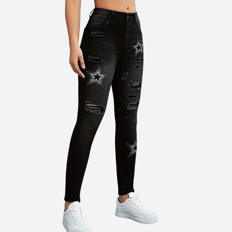 Women's ripped skinny jeans star print denim pants in black, side view