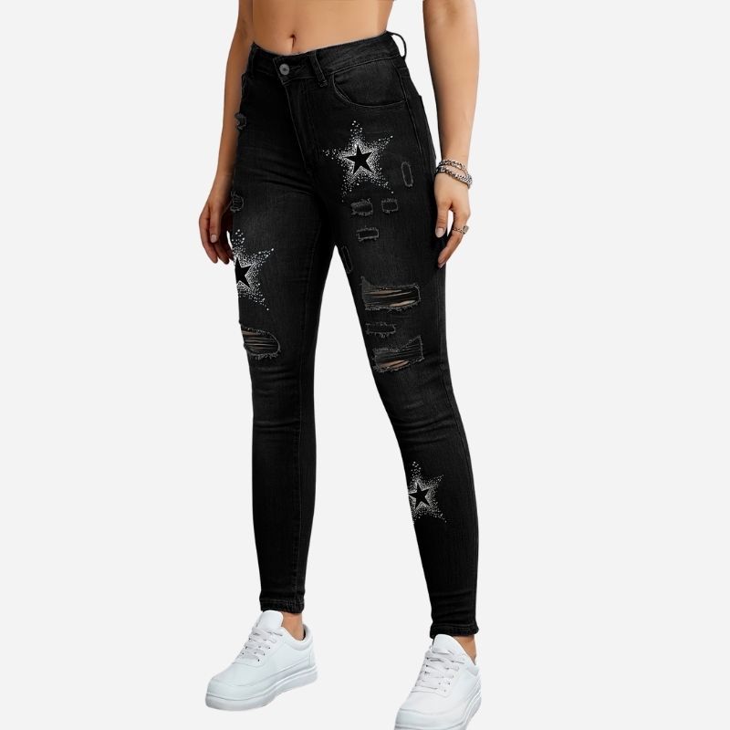 Women's ripped skinny jeans star print denim pants in black, side view