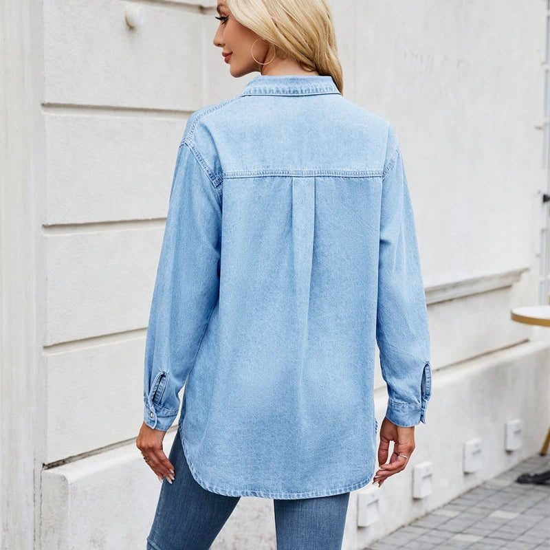 women's long sleeve denim button down shirt in light blue, back view