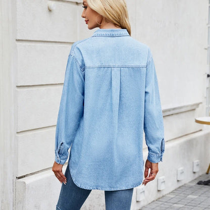 women's long sleeve denim button down shirt in light blue, back view