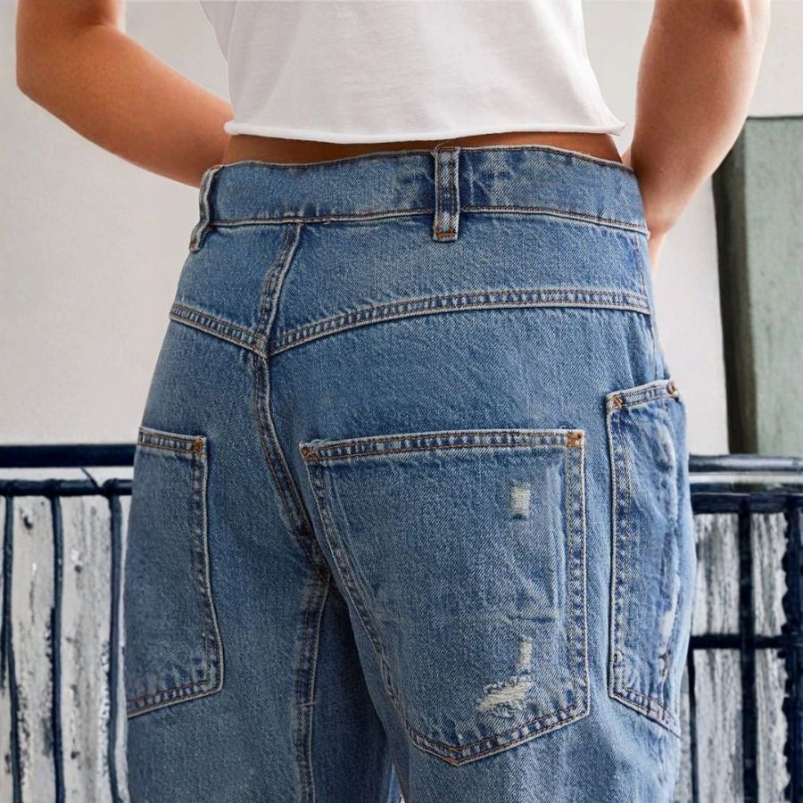 Women’s low rise ripped barrel jeans cropped straight leg baggy denim in blue, details view