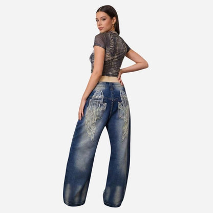 Women’s low rise y2k baggy jeans angel wings back print denim in blue, back view