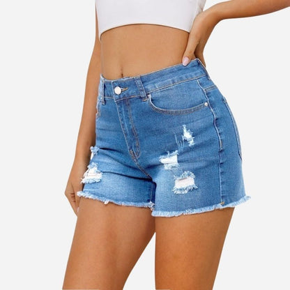 Women's ripped denim jeans shorts in blue, side view