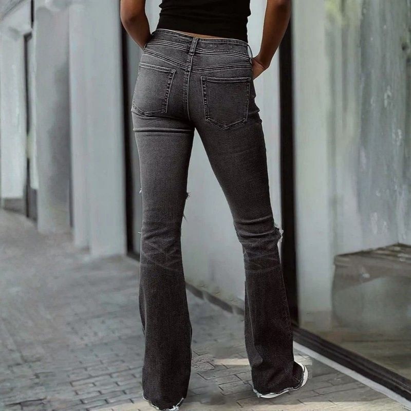 Women's ripped bell bottom jeans bootcut denim flare jeans pants in black, back view