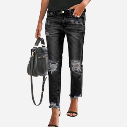 Women's skinny jeans stretchy ripped denim pants in black, front view