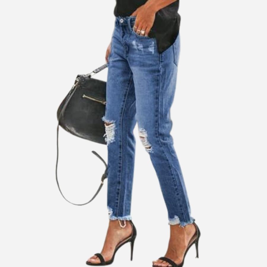 Women's skinny jeans stretchy ripped distressed denim pants in navy, side view