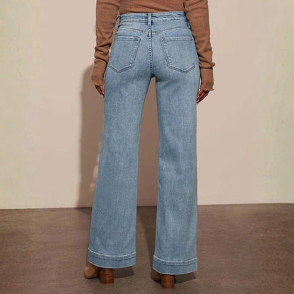 Women's straight leg denim high waist baggy palazzo jeans with front pockets in blue, back view