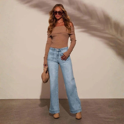 Women's straight leg denim high waist baggy jeans with front pockets in blue, front view