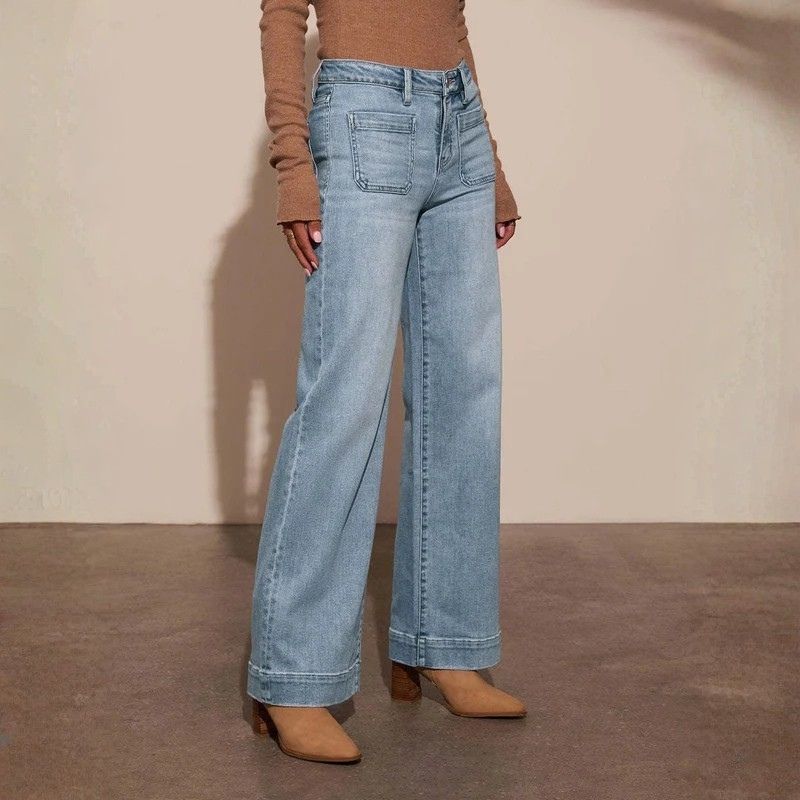 Women's straight leg denim high waist baggy palazzo jeans with front pockets in blue, side view