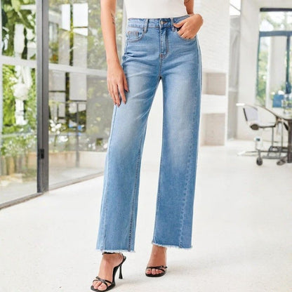 Women's wide leg jeans high waisted baggy raw hem denim in blue, front view