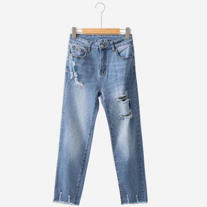 Women's jeans high waisted stretchy ripped distressed denim pants in blue, front view