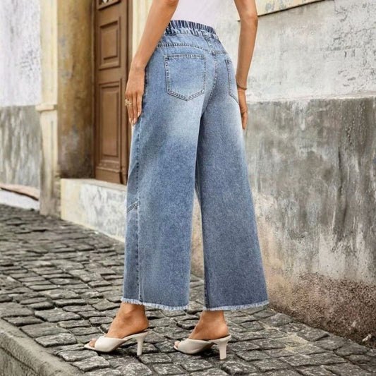 Women's floral embroidered pull on denim straight wide leg baggy jeans, back view