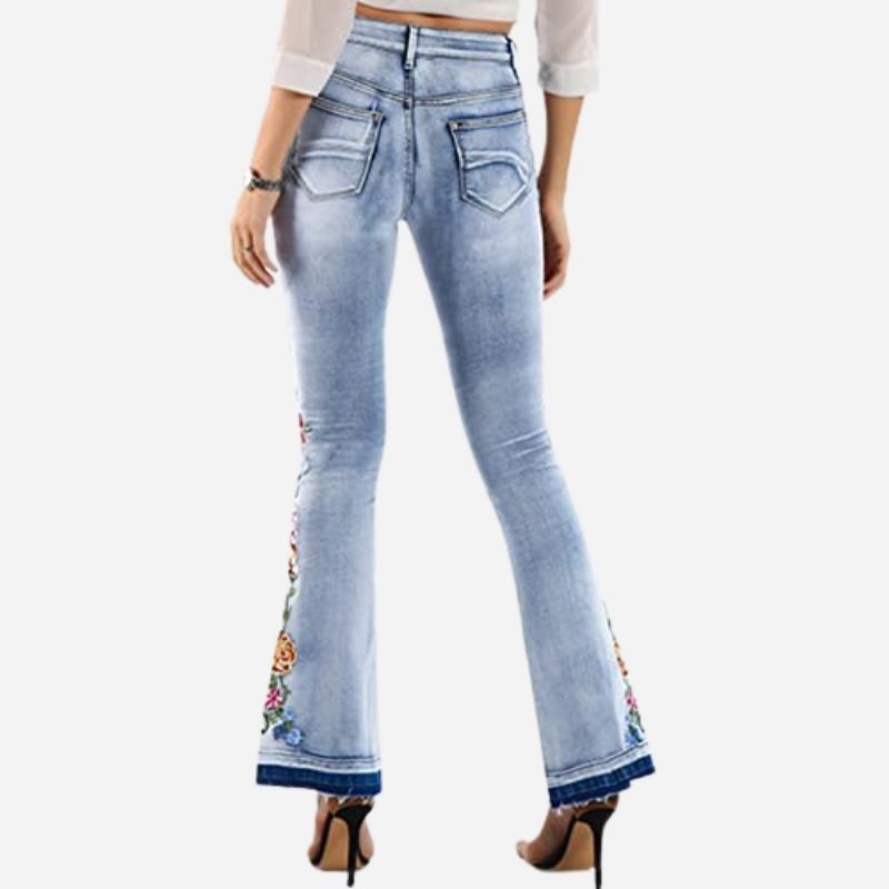 Women's retro floral embroidered flare jeans, back view